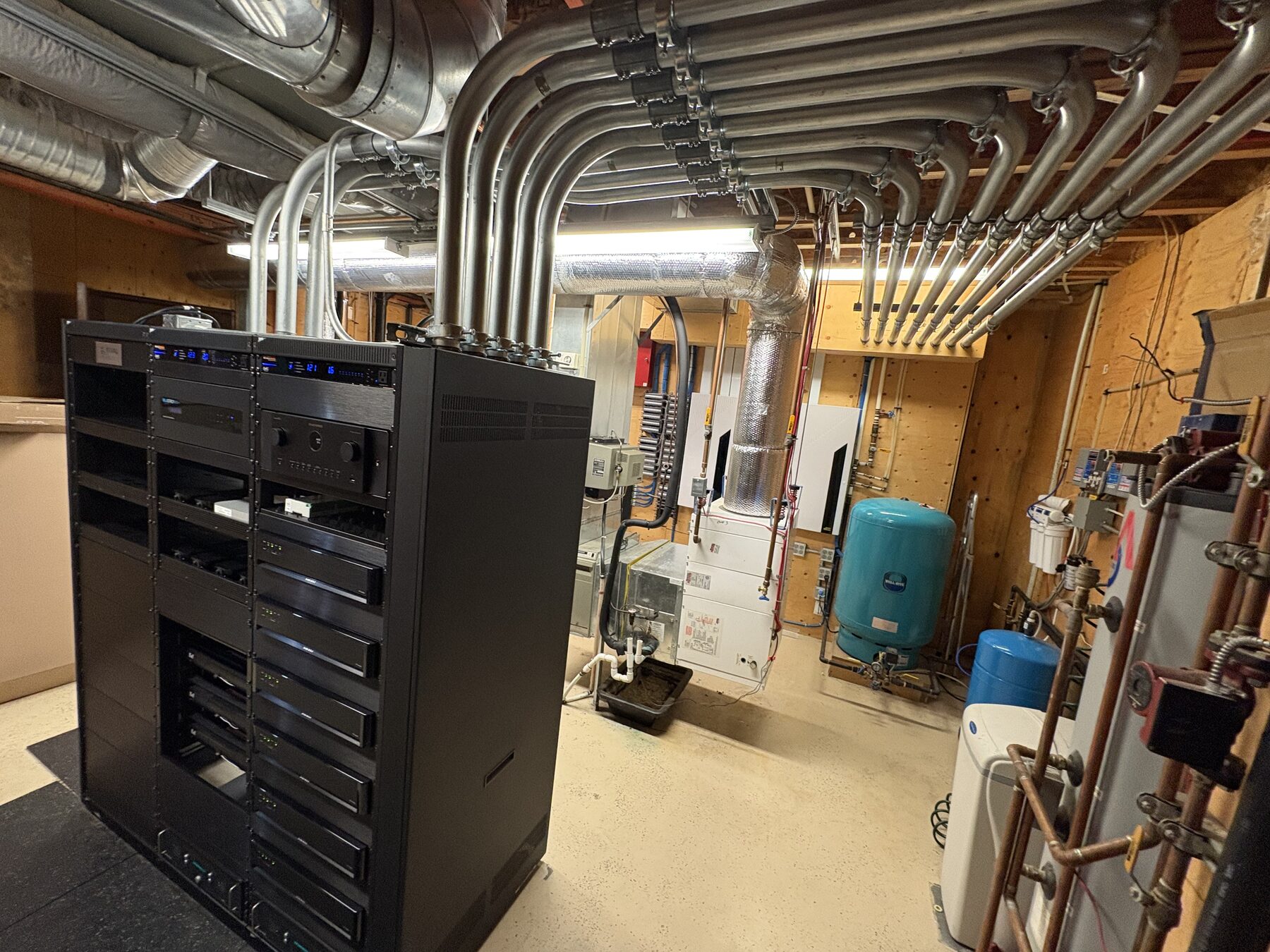 Equipment rack installed in mechanical room